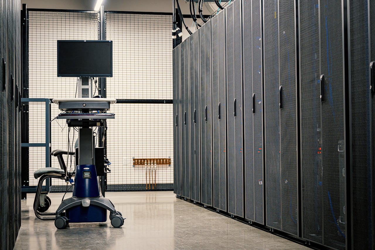 The Art of Drawing Readers In: Your attractive post title goes here Contemporary computer on support between telecommunication racks and cabinets in modern data center